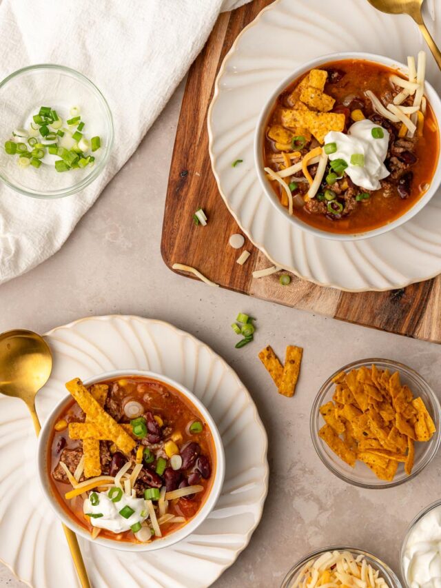 Two Bowls of Taco Soup with Toppings on Top