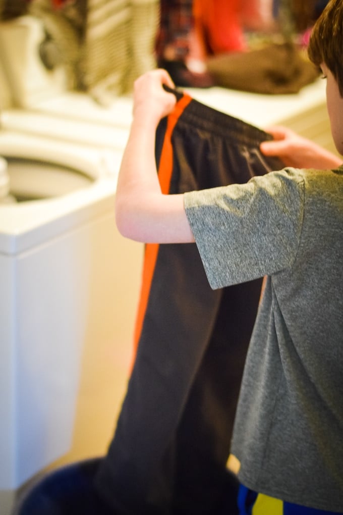 As part of our family's laundry routine, our older kids do their own laundry.