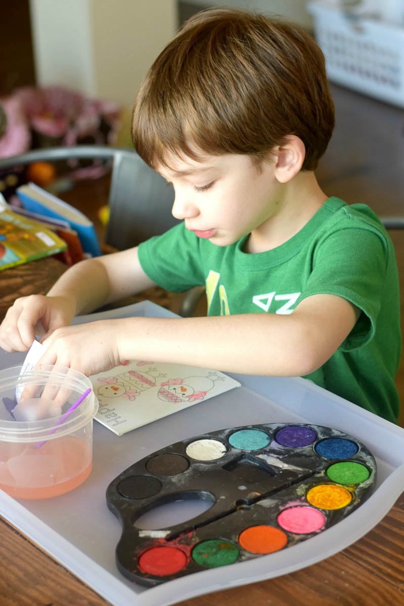 Young Boy Painting with Watercolors