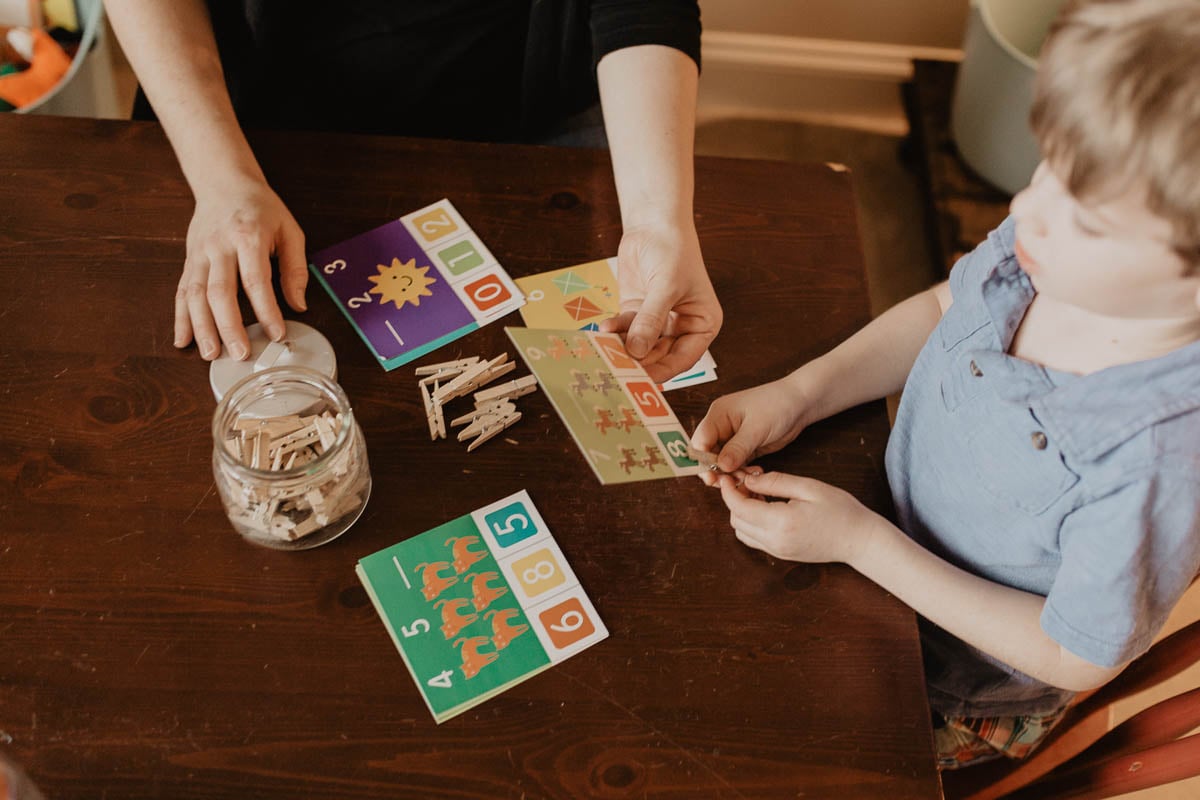 Young Boy Playing a Math Game