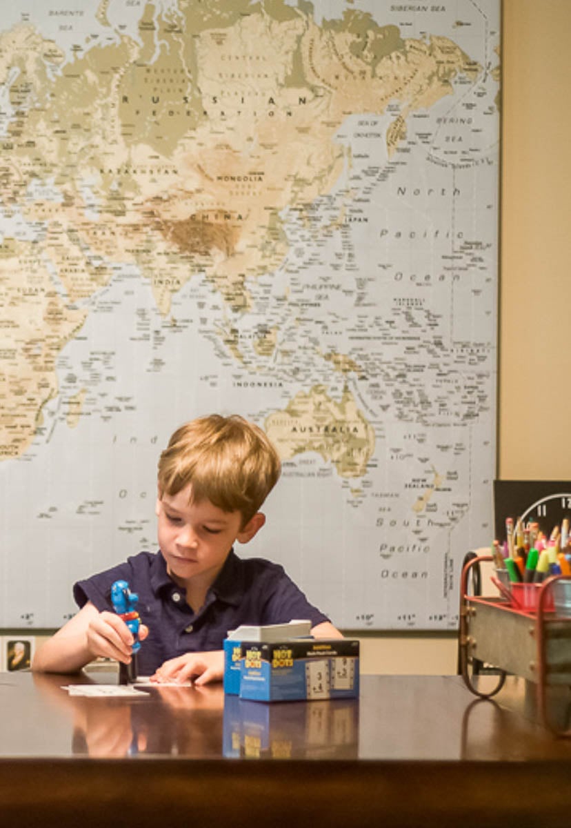 Young Boy Playing Hot Dots Game