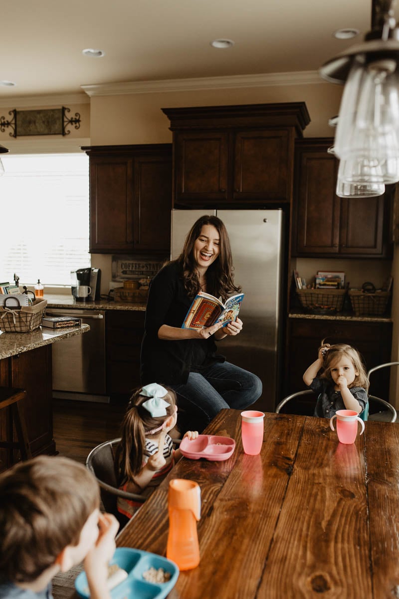 Kids Sitting at Table Listening to a Read-Aloud
