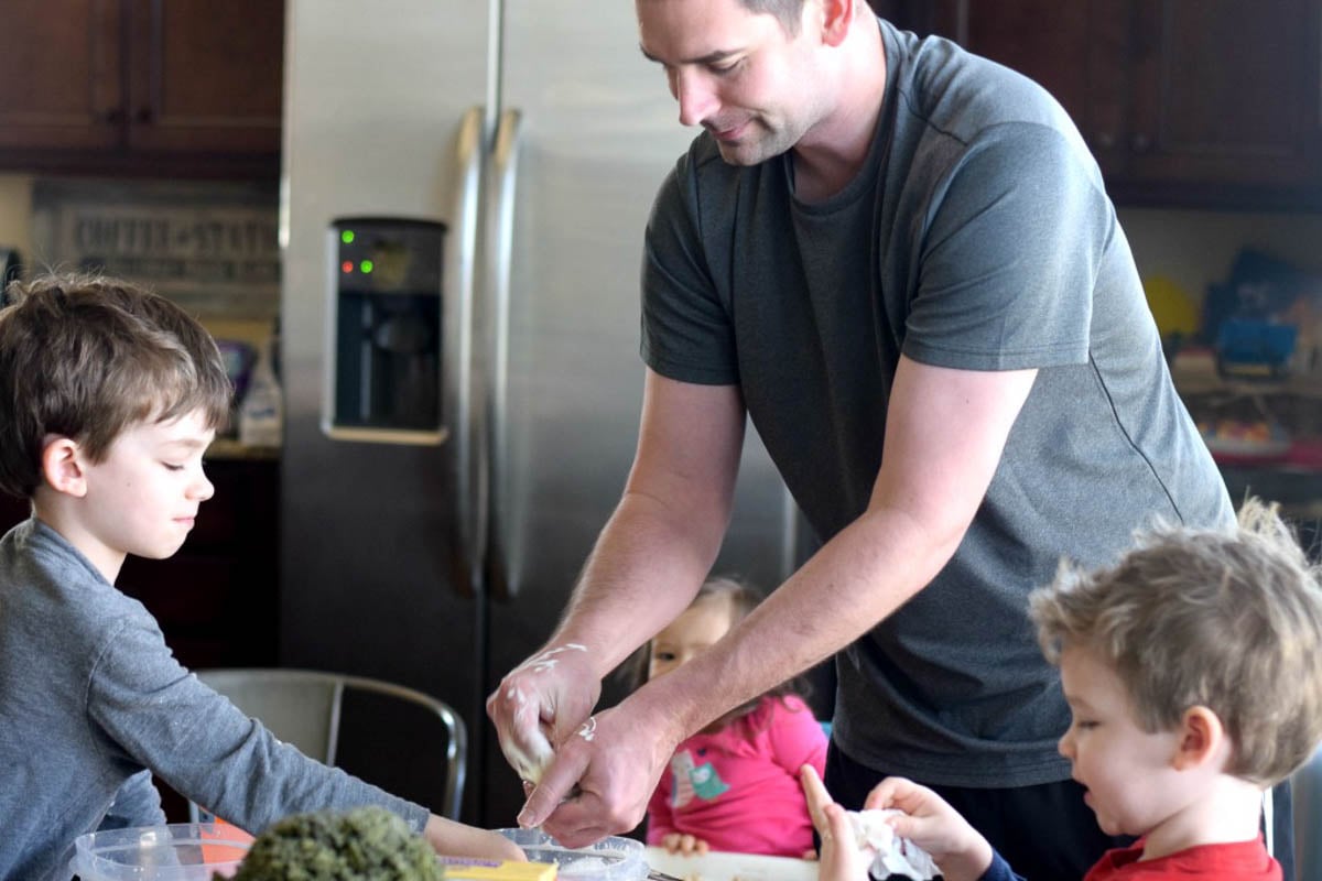 Father and Kids Doing a Science Experiment Together
