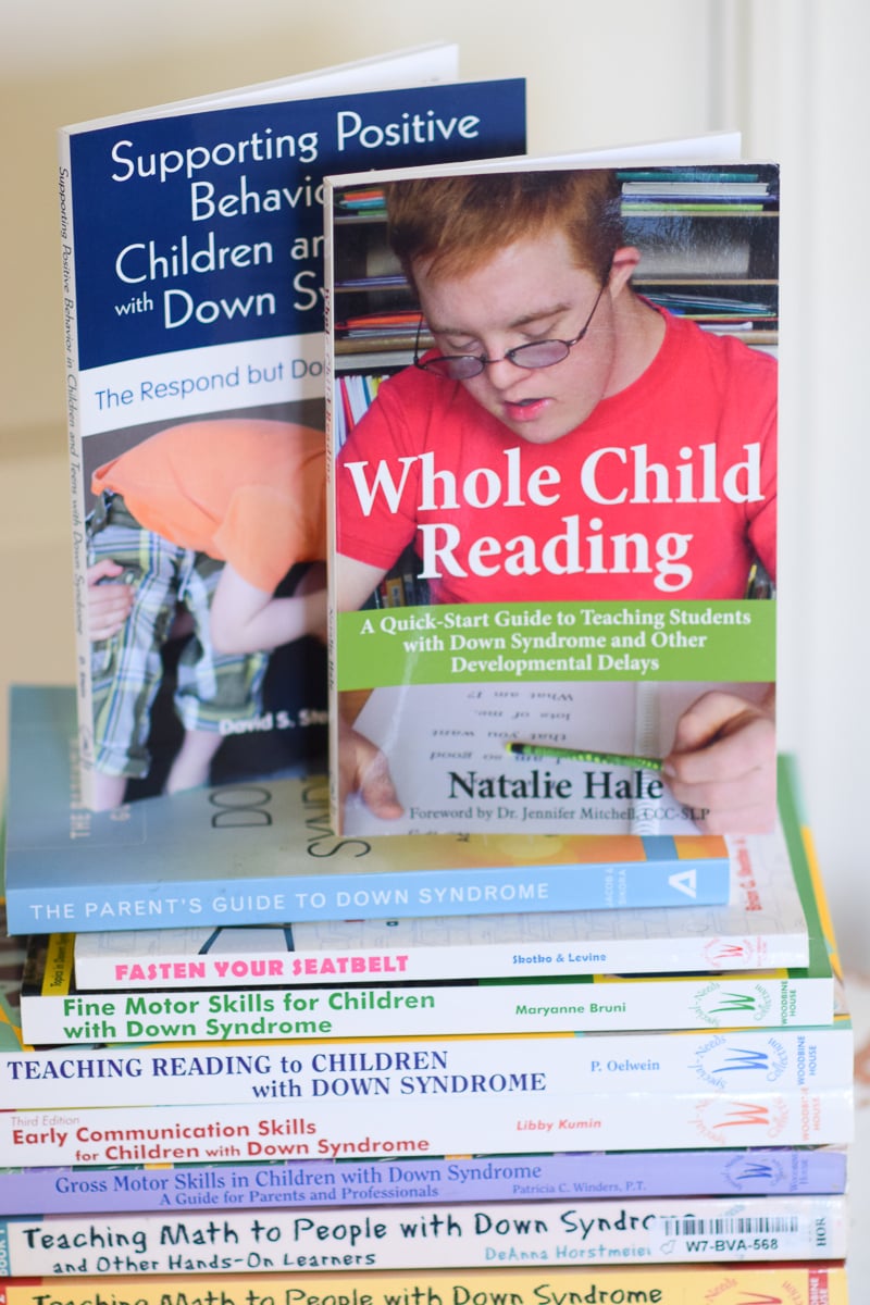 Books Sitting on Top of a Table