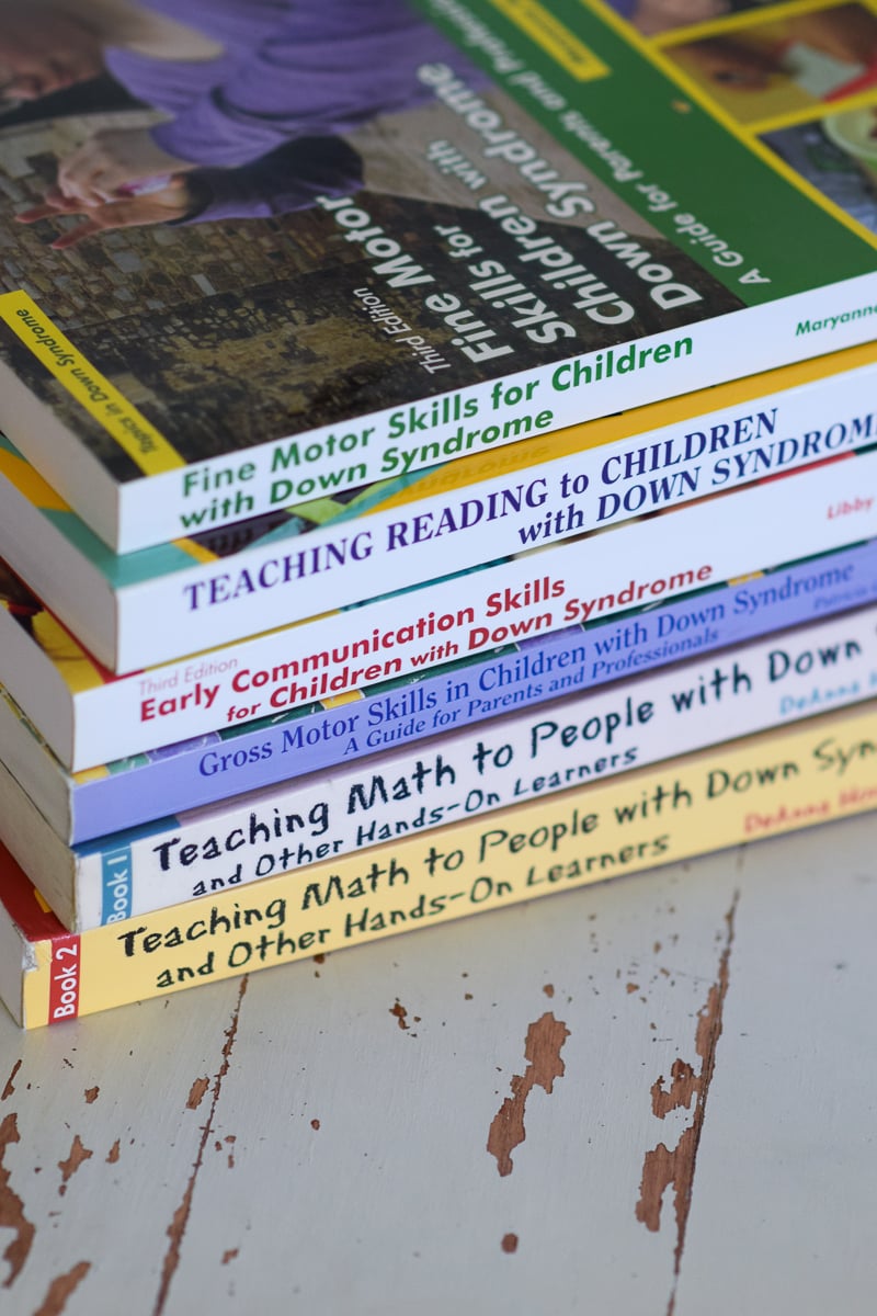 Books Sitting on Top of a Table