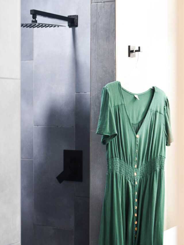 Green Dress Hanging on a Bathroom Hook