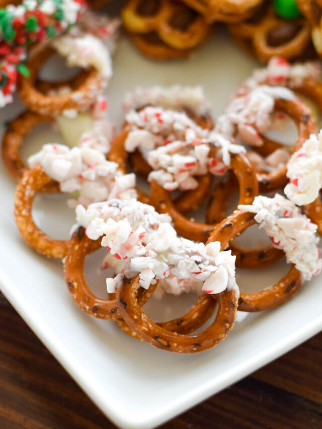 White Chocolate Candy Cane Pretzels on a White Plate
