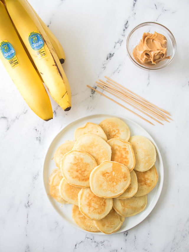 Pancakes with Peanut Butter and Bananas on Kitchen Counter Top