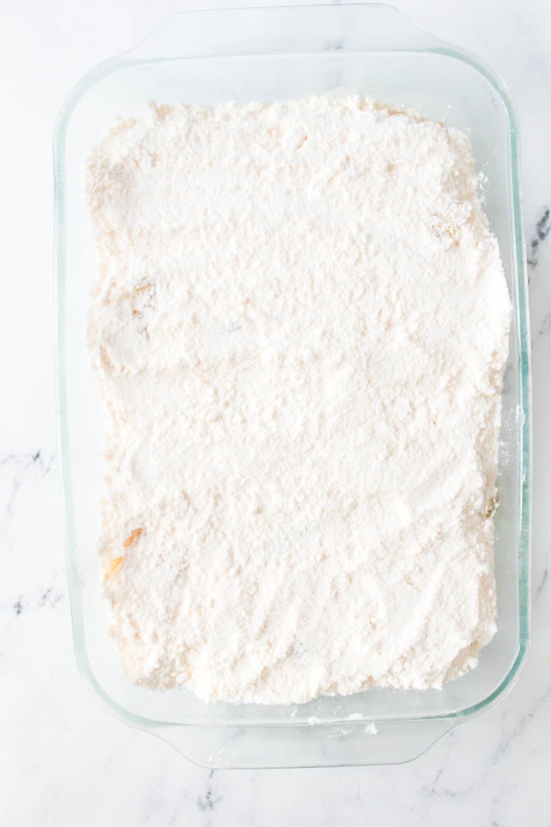 Apple Pie Filling and Cake Mix in Glass Baking Dish