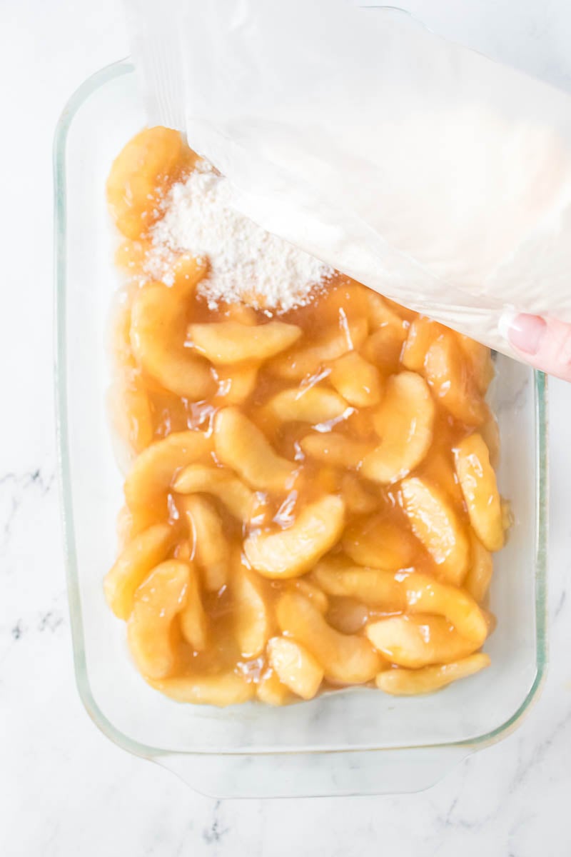 Apple Pie Filling and Cake Mix in Glass Baking Dish