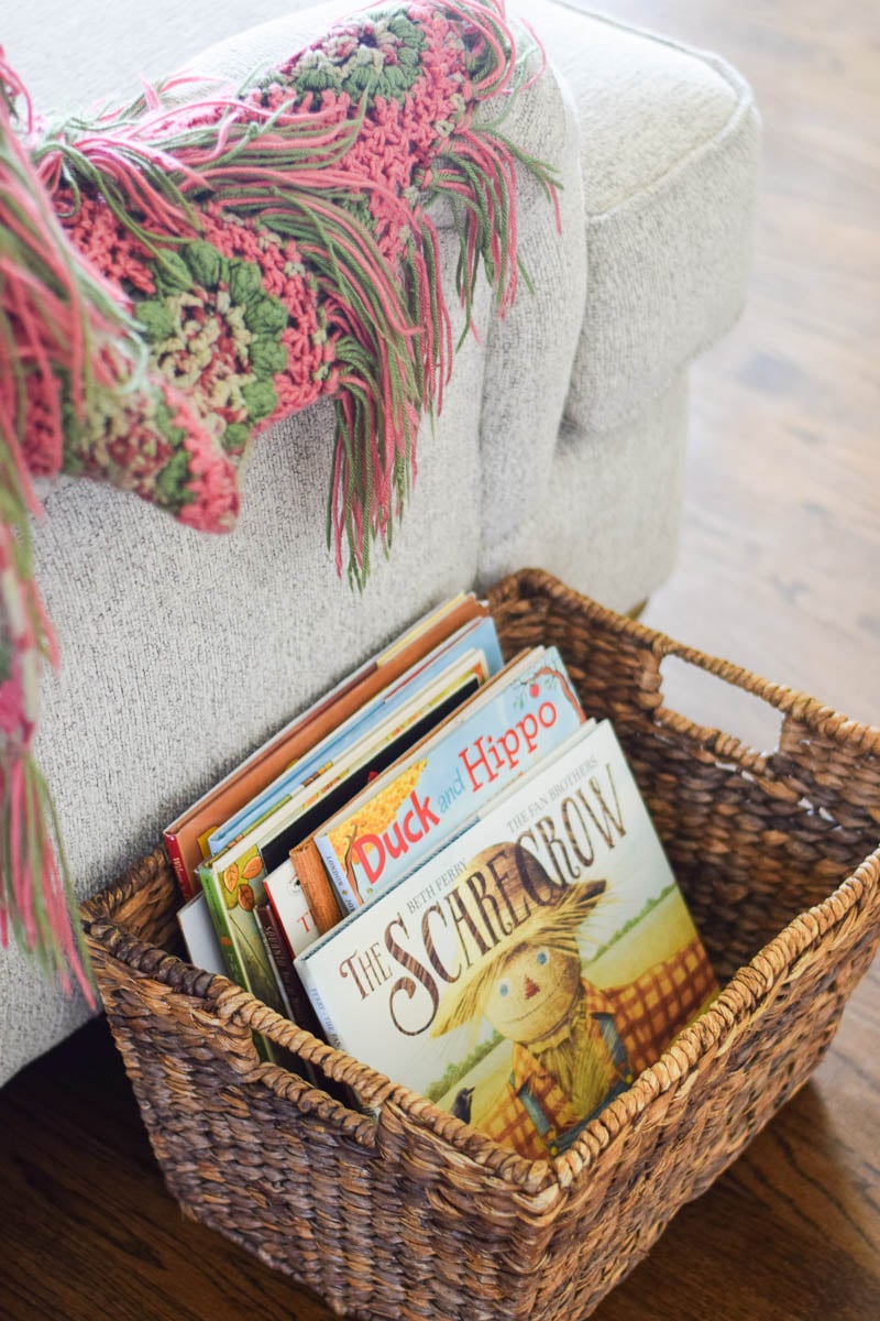 Fall Books Organized in Brown Woven Basket