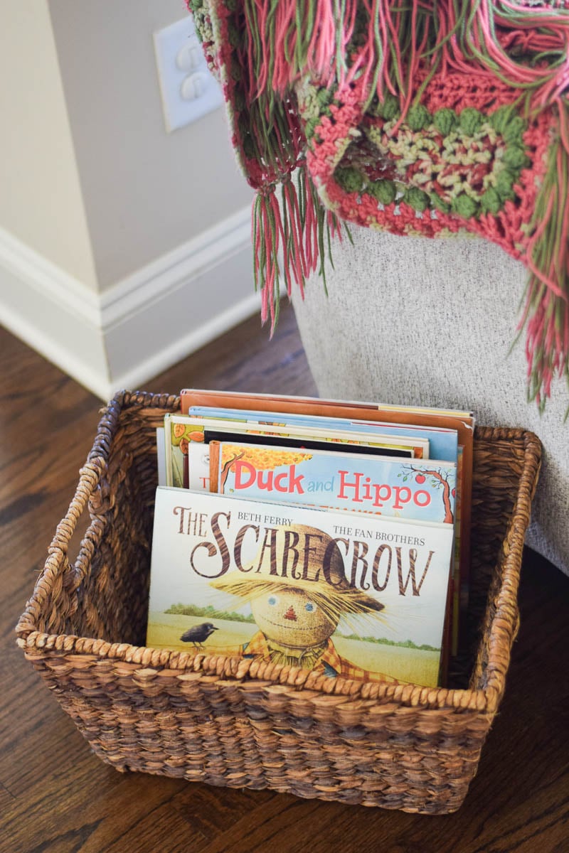 Fall Books Organized in Brown Woven Basket