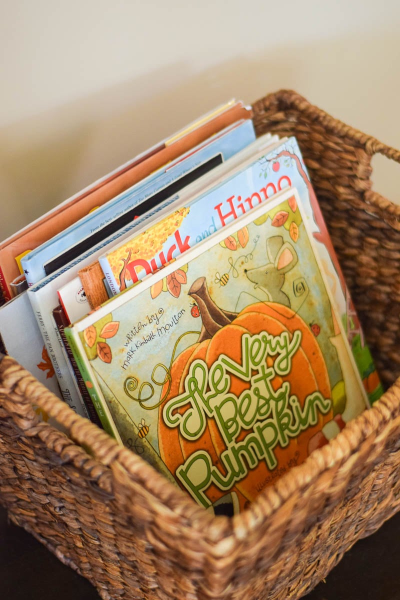 Fall Books Organized in Brown Woven Basket