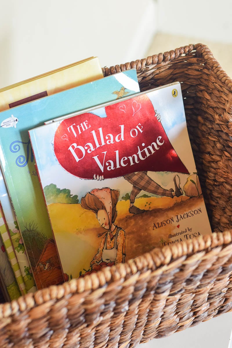 Valentine's Day Books Organized in Brown Woven Basket
