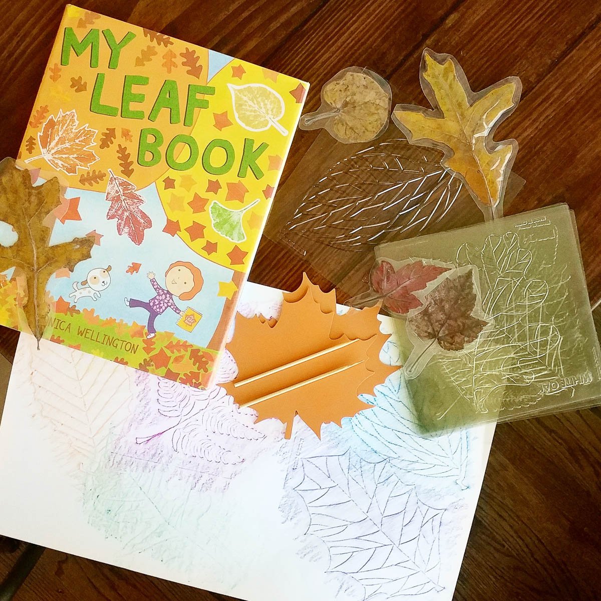 Book and Art Supplies Sitting on Table 