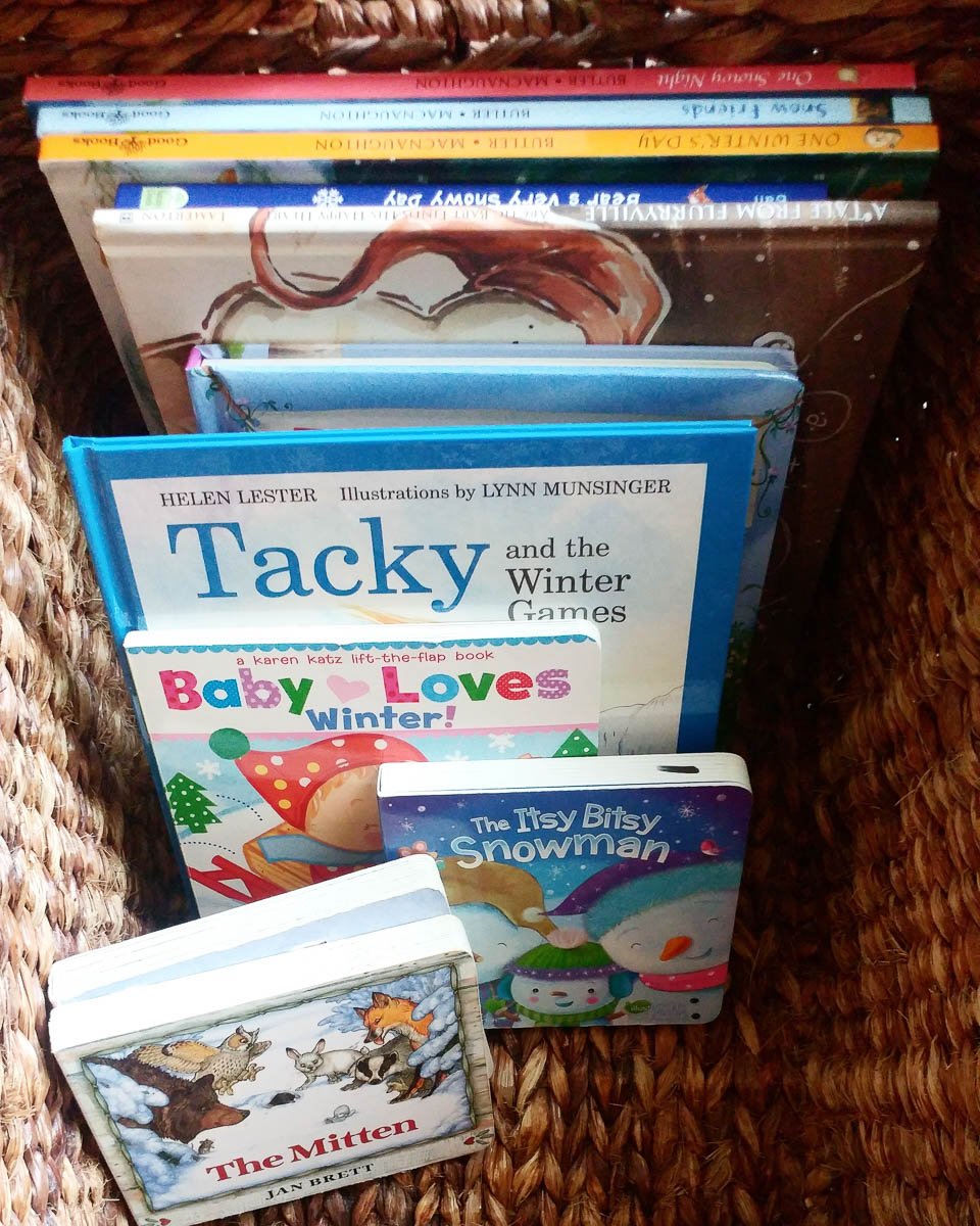 Winter Books Organized in a Basket