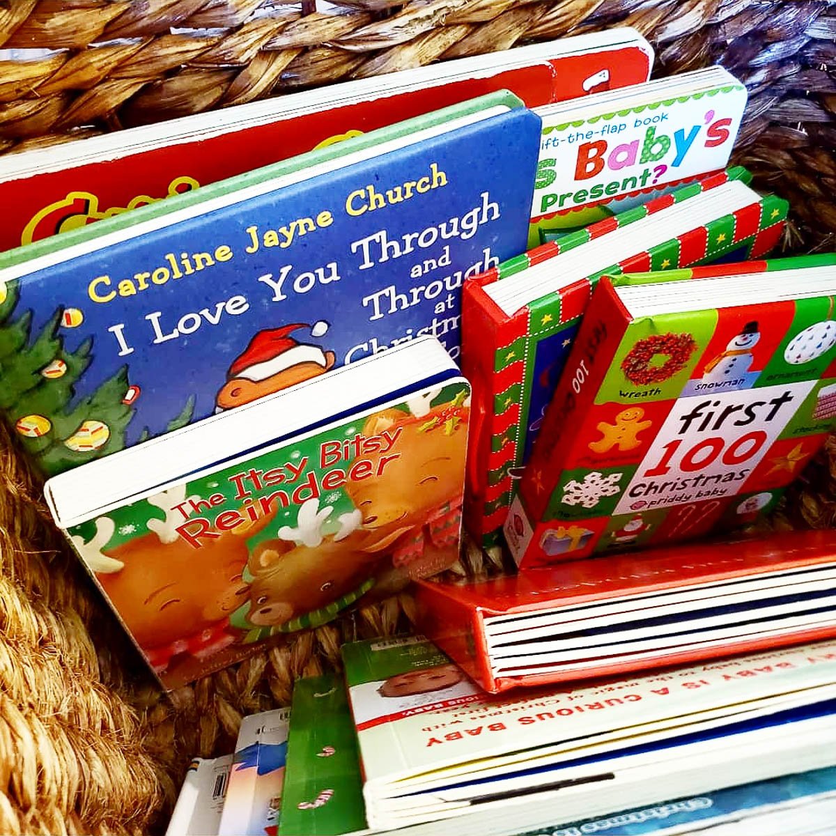 Christmas Books Organized in a Basket