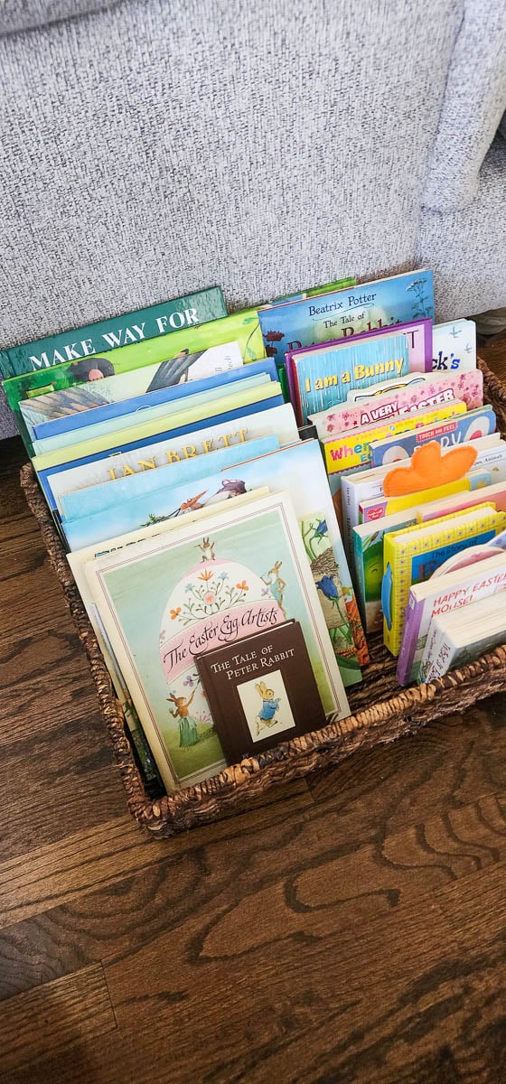 Easter Books Organized in Brown Woven Basket