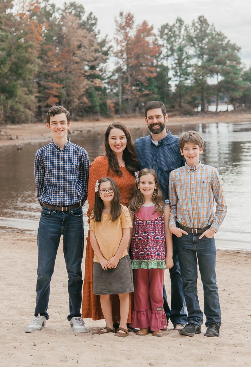Family Standing on a Beach