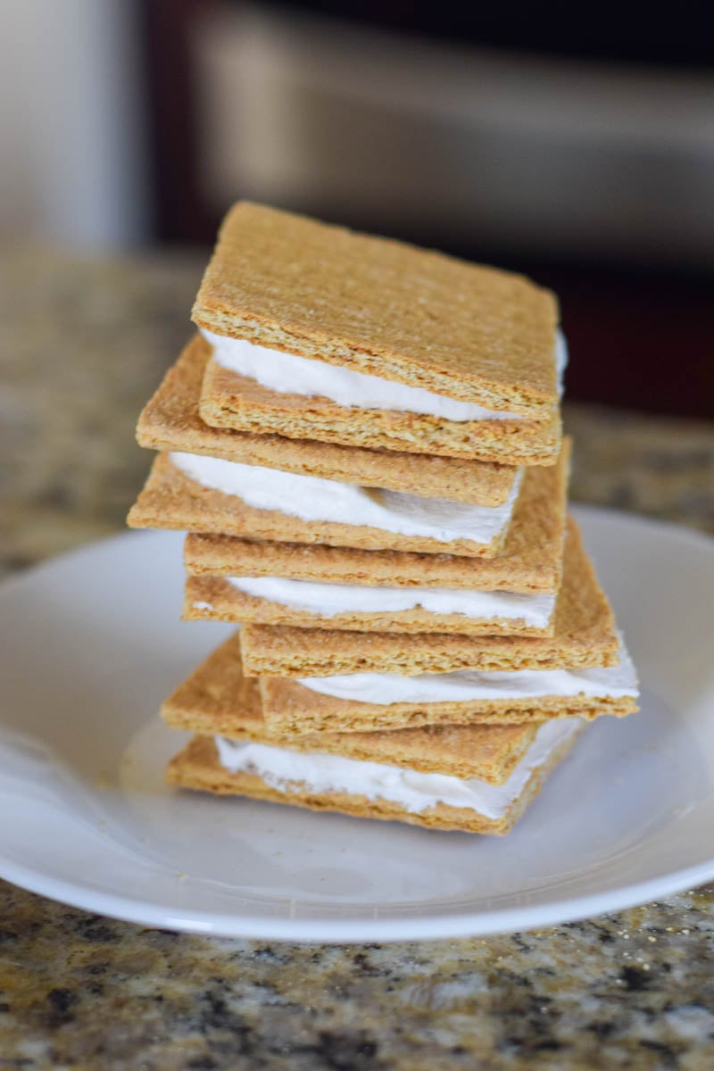 Cool Whip Graham Cracker Sandwiches Sitting on White Plate