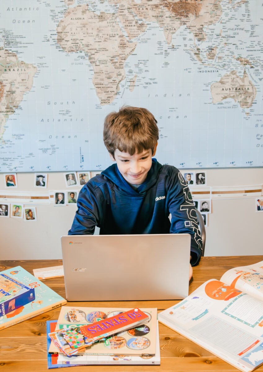 Middle School Boy Working at the Computer