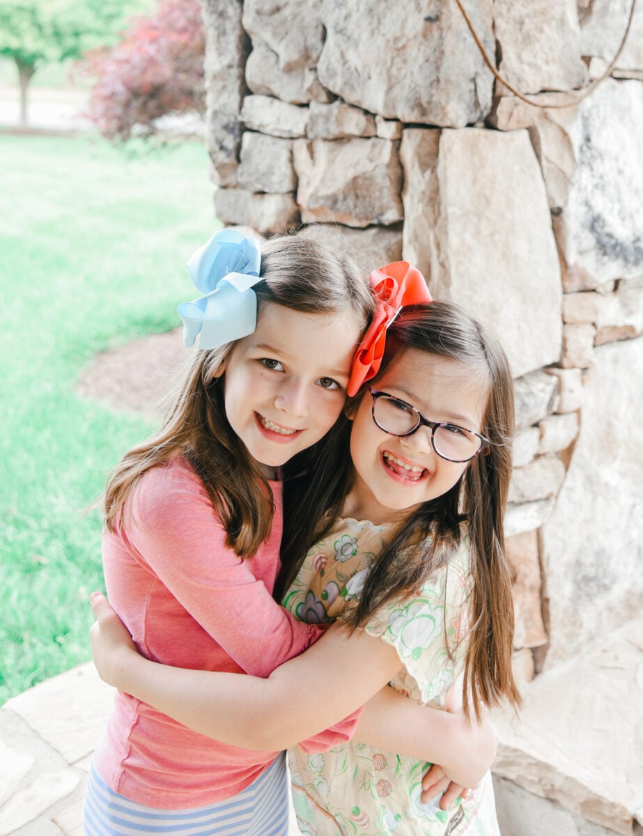Sisters Smiling for a Photo