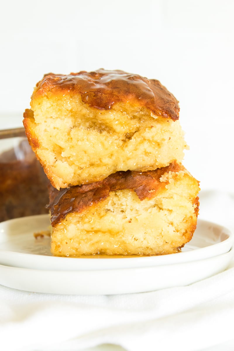 Two Biscuits Sitting on a White Plate