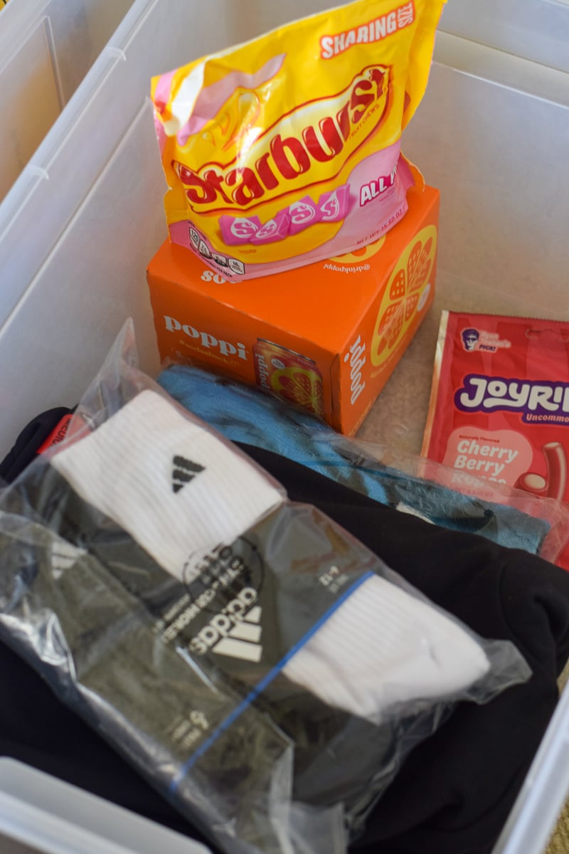 Inside a Bin of Gifts for a Teenage Boy
