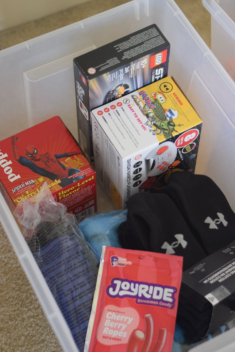 Inside a Bin of Gifts for a Teenage Boy
