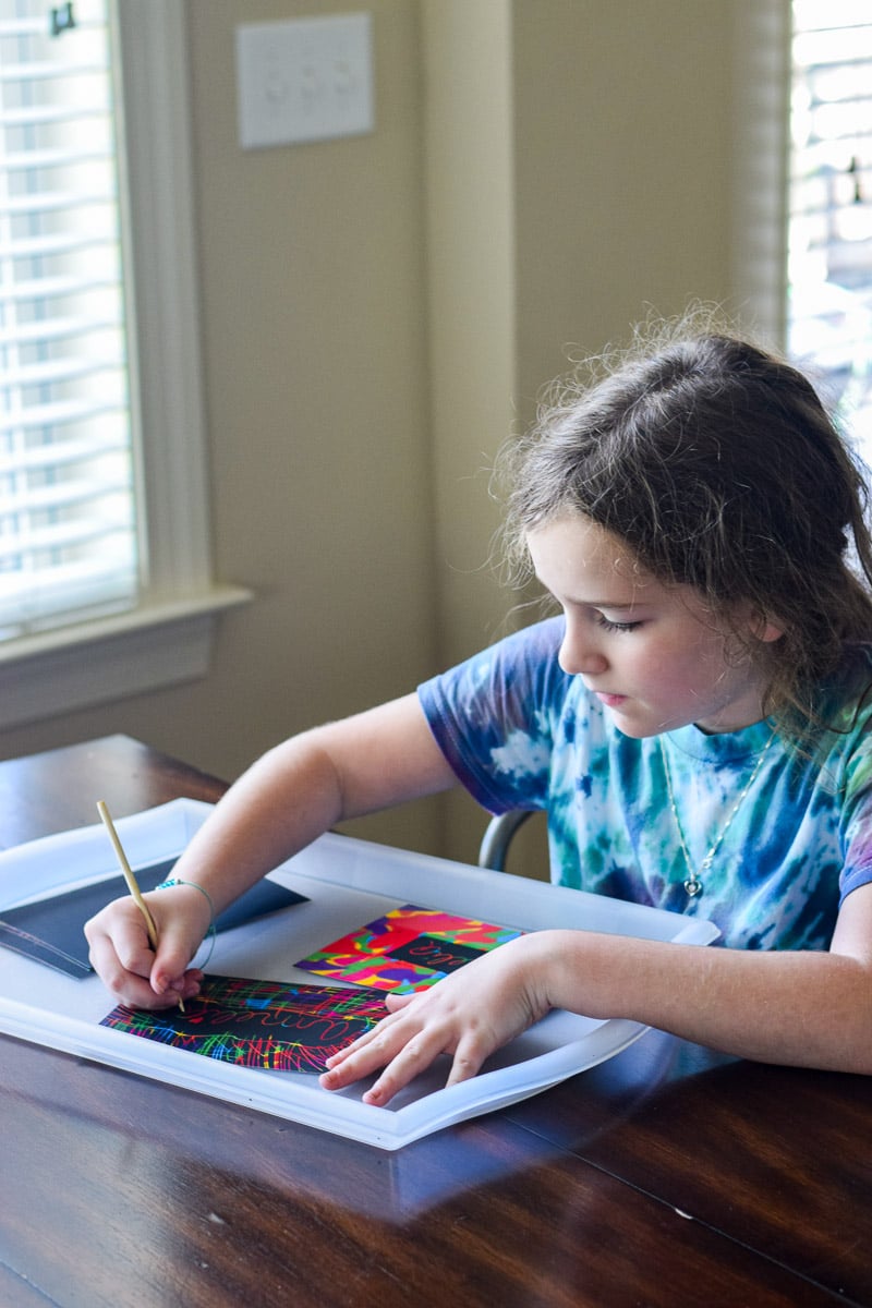Young Girl Writing in Cursive